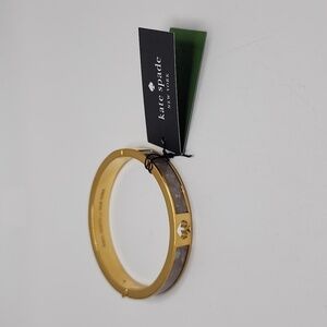 kate spade New York Hinged Hole Punch Bangle Gold & Cream